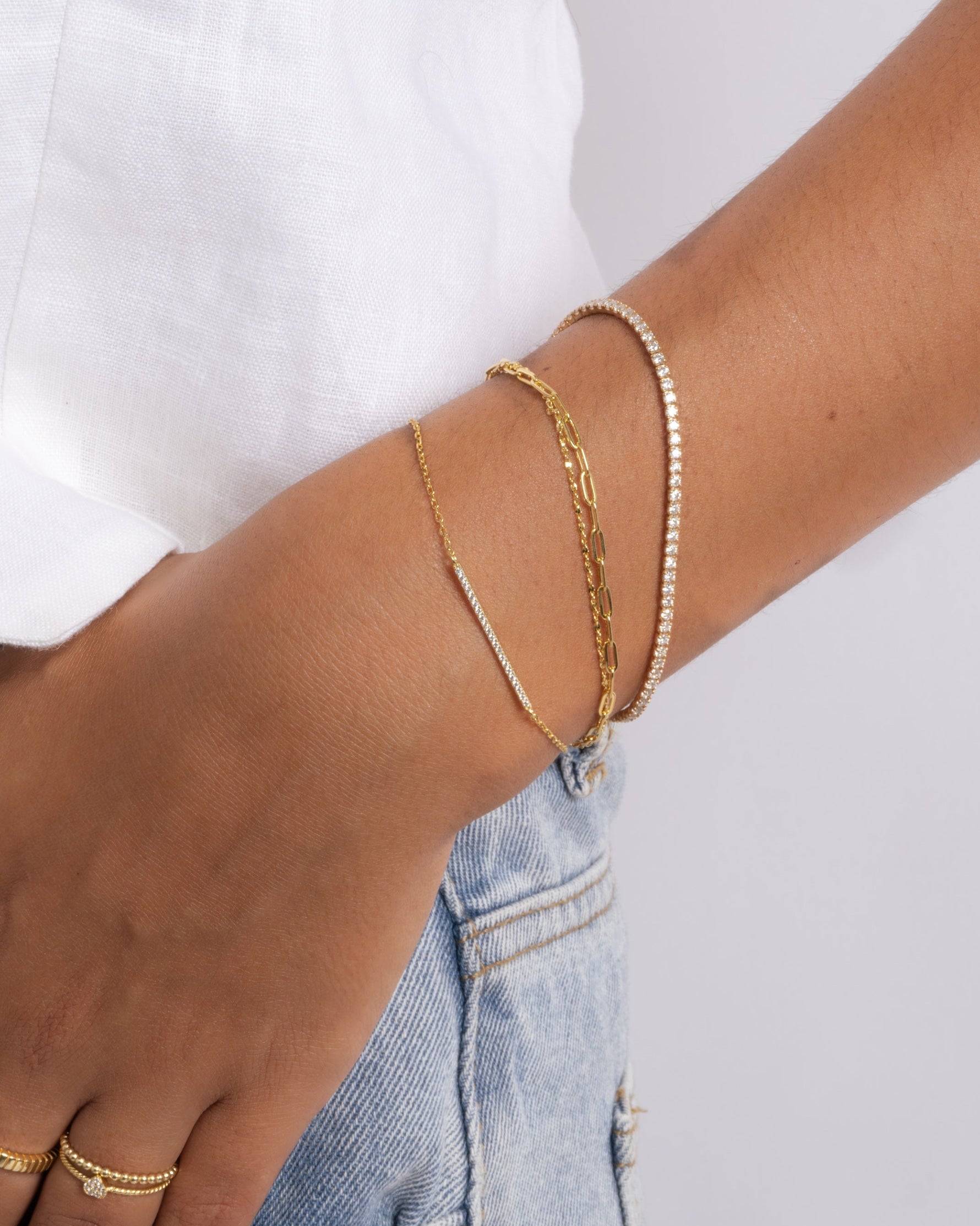 Sami Jewels Pavé Bar Diamond Bracelet stacked with other bracelets, featuring a sleek pave diamond design for elegant wristwear.