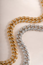 Gold and silver pavé chain link bracelet from Sami Jewels featuring intricate, sparkling pave detailing.