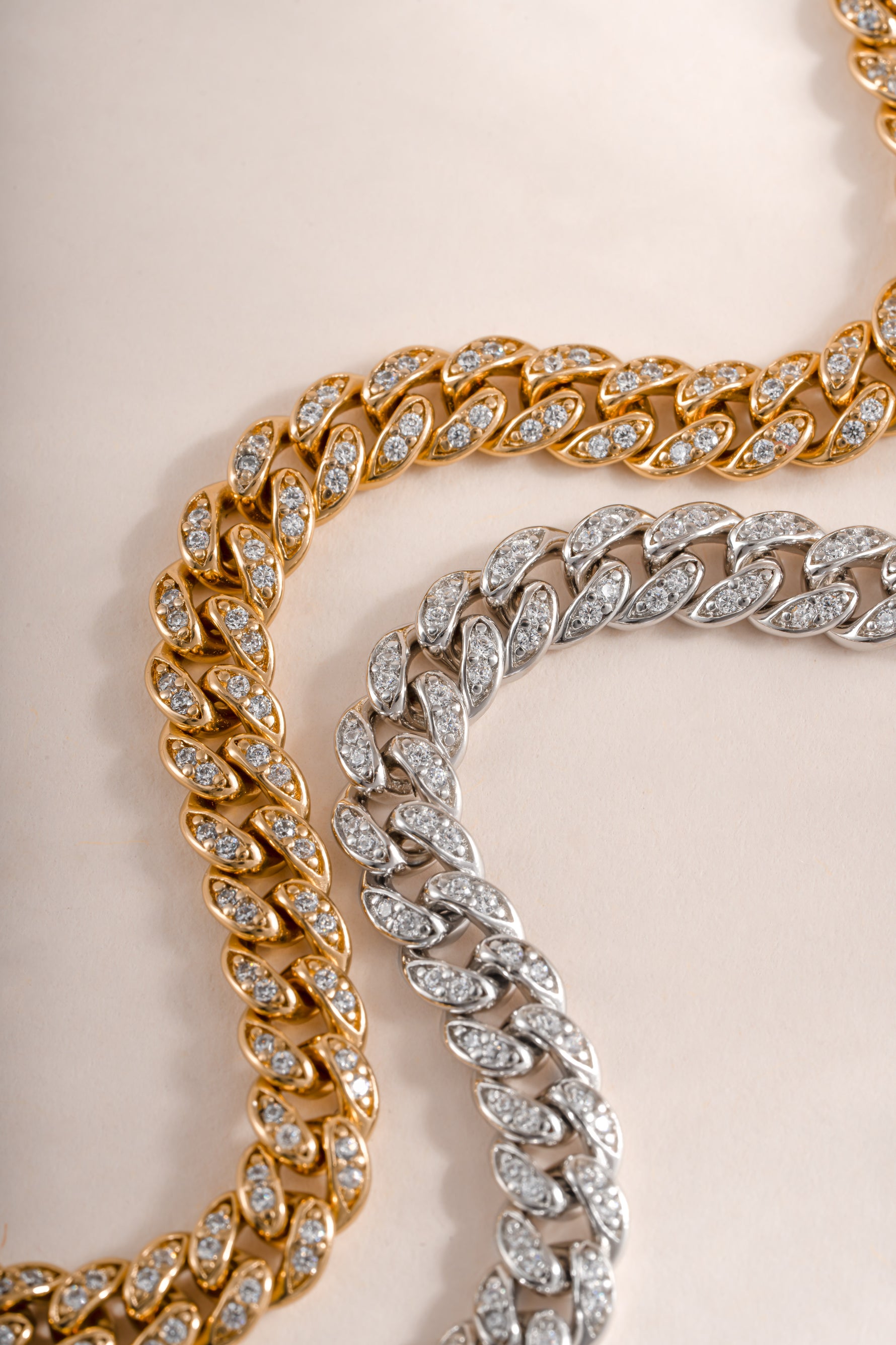 Gold and silver pavé chain link bracelet from Sami Jewels featuring intricate, sparkling pave detailing.