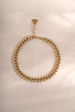 Gold Sami Jewels Pavé Chain Link Bracelet displayed flat, showcasing intricate pave detailing and sleek chain design.