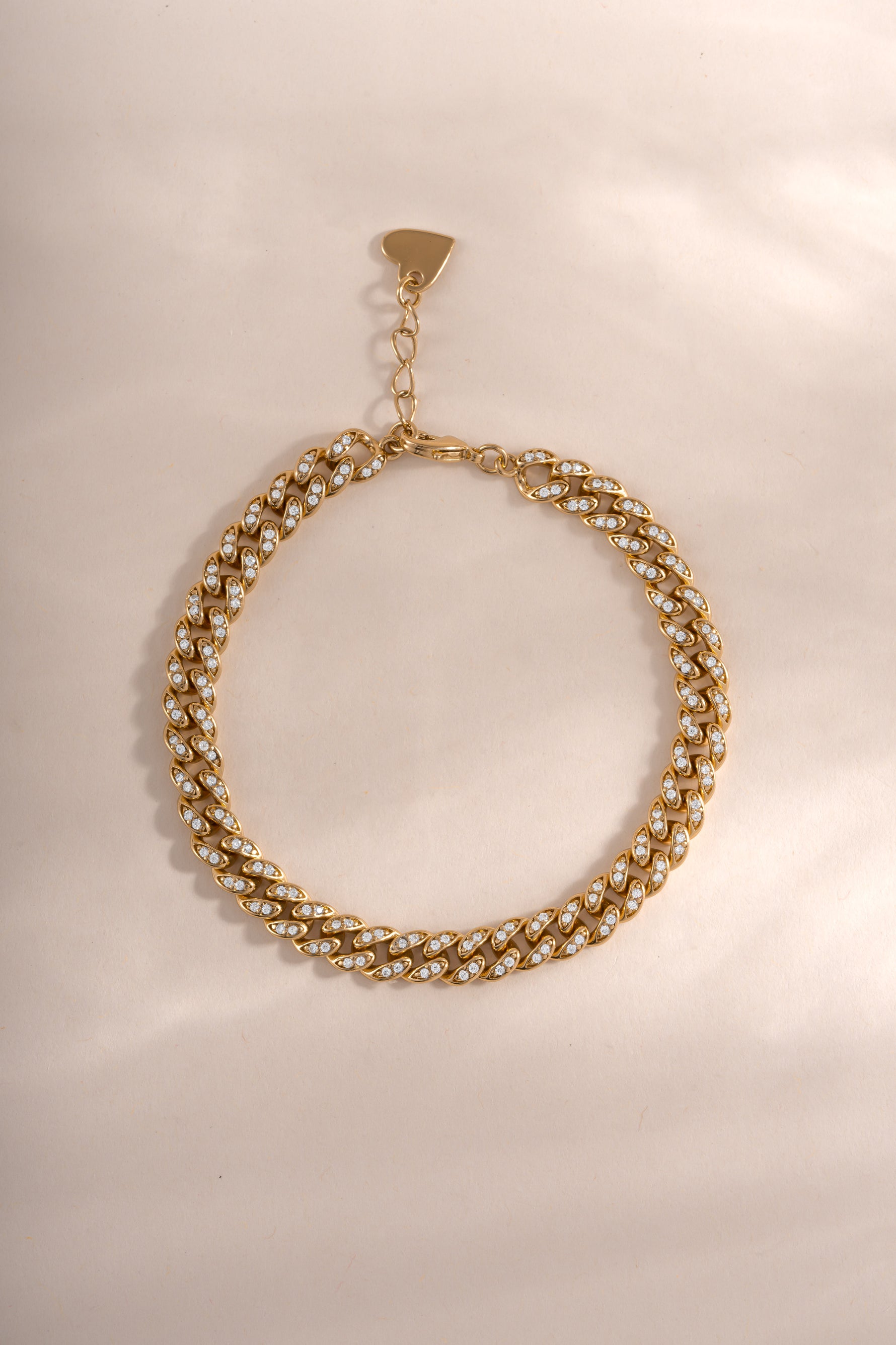 Gold Sami Jewels Pavé Chain Link Bracelet displayed flat, showcasing intricate pave detailing and sleek chain design.