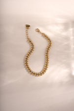 Gold Pavé Chain Link Bracelet by Sami Jewels with a lobster clasp closure, showcasing intricate pave detailing and linked chain design.