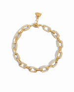 Gold pave chain link bracelet by Sami Jewels displayed on a white background, showcasing its intricate design and shiny finish.