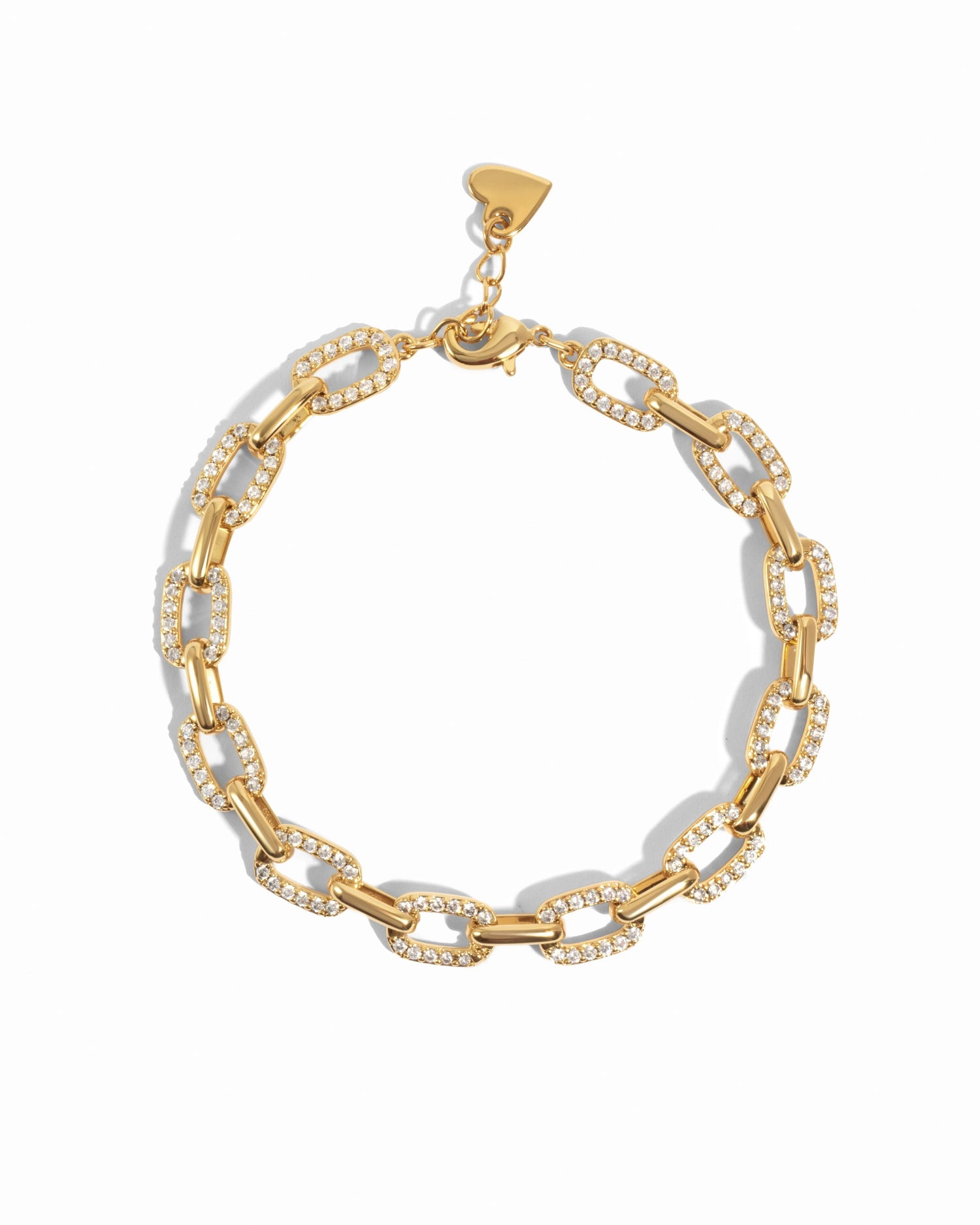 Gold pave chain link bracelet by Sami Jewels displayed on a white background, showcasing its intricate design and shiny finish.