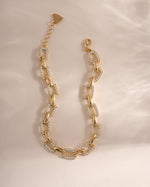 Gold pave chain link bracelet by Sami Jewels featuring a sleek, sparkling design with intricate links.
