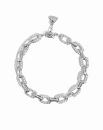 Sterling silver pave chain link bracelet by Sami Jewels displayed against a white background.