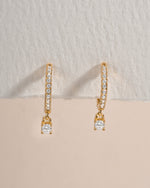 Gold Pavé Charm Huggies earrings by Sami Jewels featuring sparkling pave detailing and a secure hoop design.