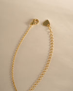 Gold Pavé Dog Tag Necklace by Sami Jewels with lobster clasp closure, featuring sparkling pave details on a stylish chain.