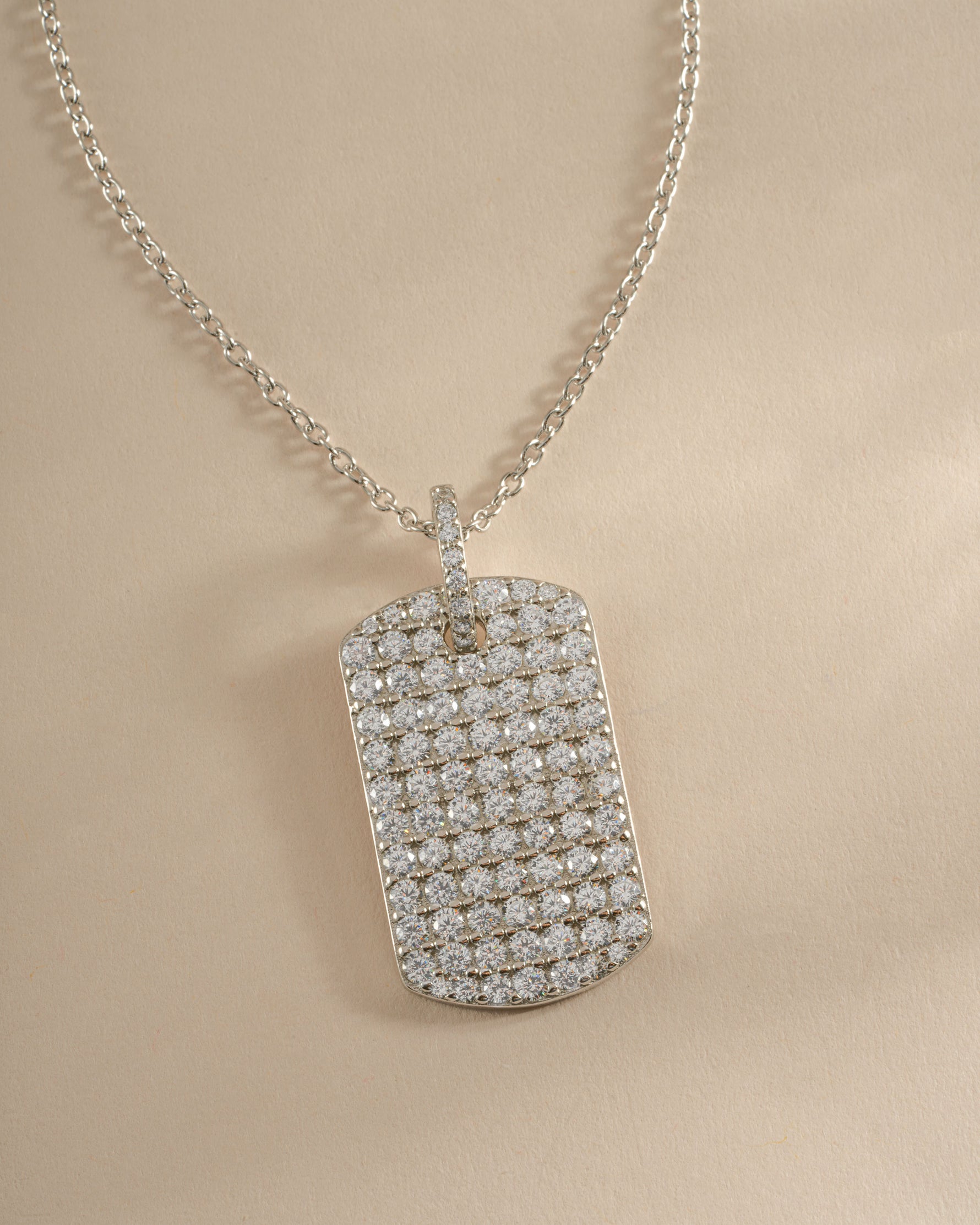 Sterling silver Pavé Dog Tag Necklace by Sami Jewels featuring sparkling pave details and a sleek, modern design.
