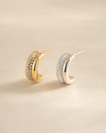 Gold and sterling silver pavé double hoop earrings by Sami Jewels featuring sparkling gemstone accents.