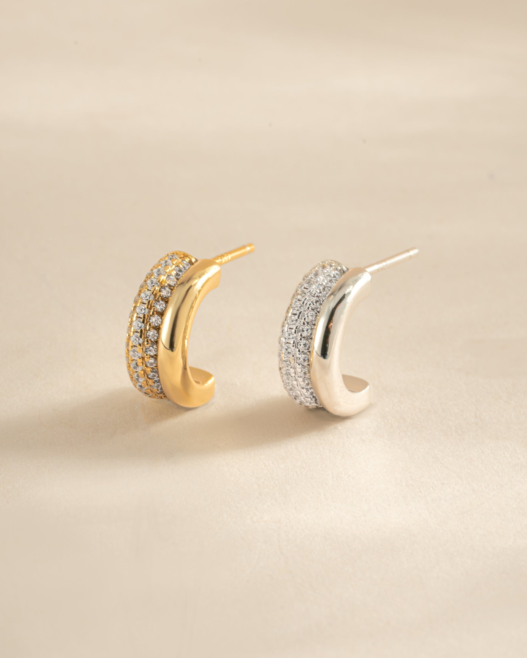 Gold and sterling silver pavé double hoop earrings by Sami Jewels featuring sparkling gemstone accents.