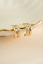 Gold Pavé Double Hoop Earrings by Sami Jewels, angled view showcasing intricate pave detailing and hoop design.