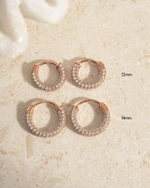 Rose gold 14mm Pavé Hoop Earrings by Sami Jewels, showing different sizes with sparkling pavé detailing.