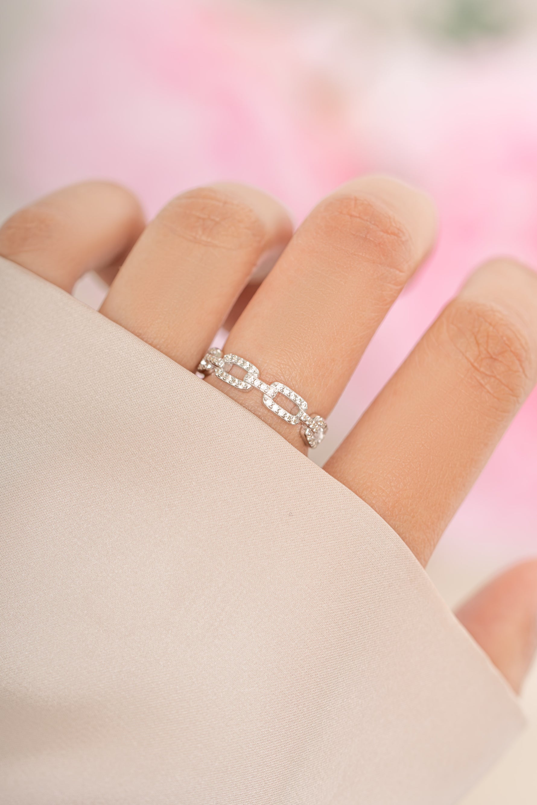 Sterling silver Pavé Link Ring with sparkling diamond accents from Sami Jewels, showcasing intricate link design and fine craftsmanship.