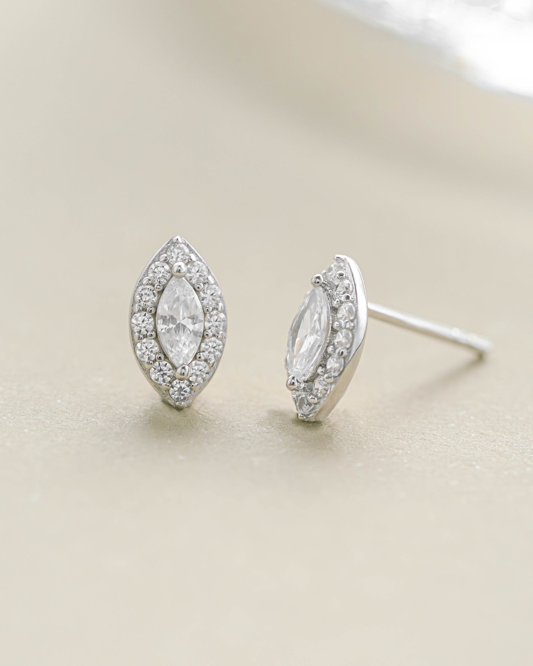 Sterling silver Halo Marquise Stud Earrings by Sami Jewels featuring pave stone detail and elegant marquise shape.