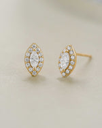 Close-up of gold Halo Marquise Stud Earrings by Sami Jewels featuring pave detailing and elegant marquise shape.