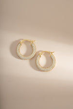Gold Pavé Tube Hoop Earrings by Sami Jewels featuring sparkling pave detailing and a sleek, modern hoop design