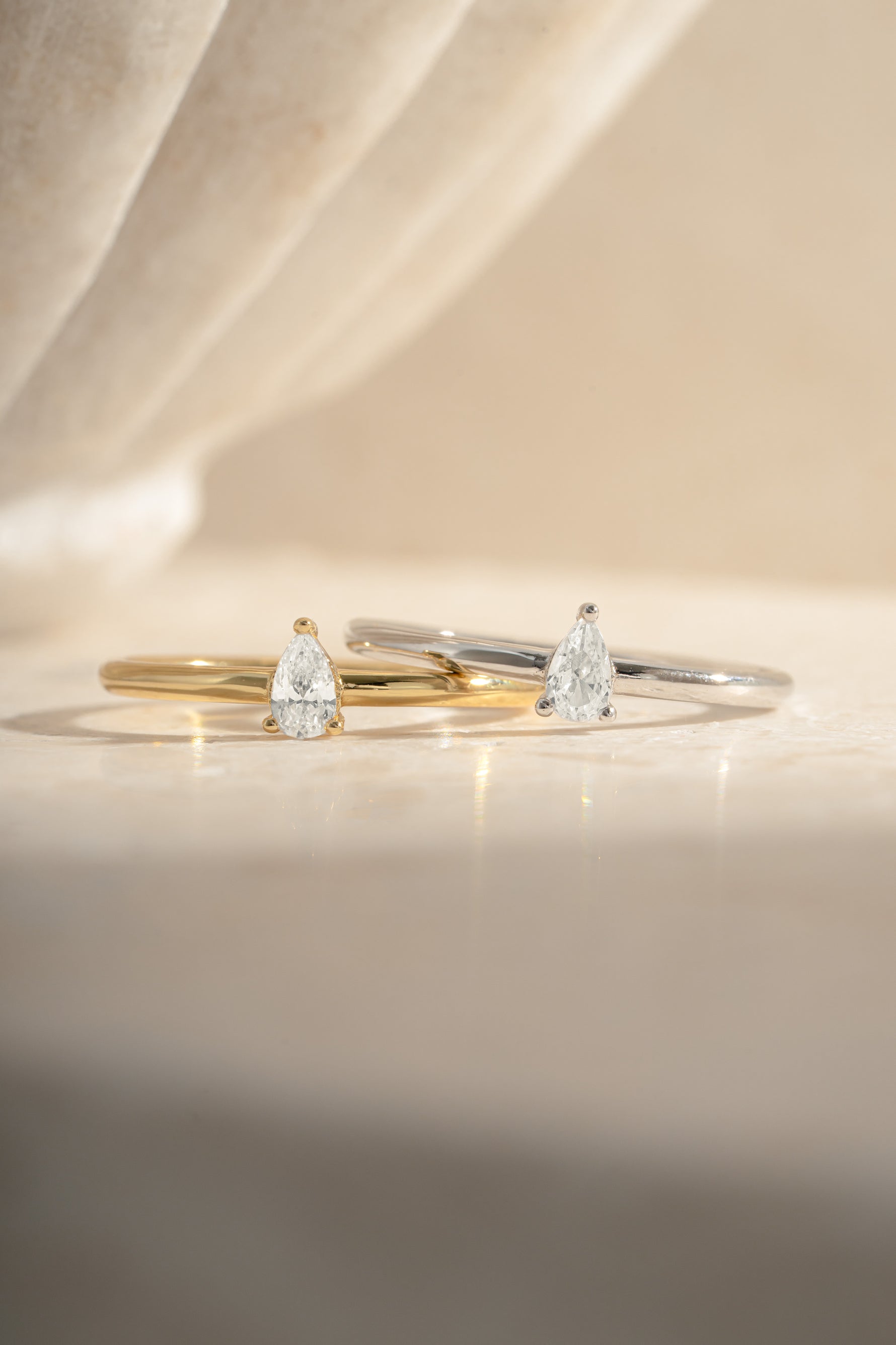 Pear-shaped gold and sterling silver ring from Sami Jewels featuring a sleek, elegant design.