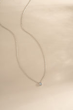 Sterling silver tear drop pendant necklace with sparkling pear-shaped diamond by Sami Jewels, showcasing elegant jewelry design.