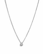 Sterling silver tear drop pendant necklace featuring a pear-shaped diamond from Sami Jewels on a white background.