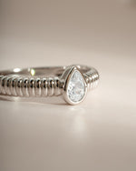 Close-up of Sami Jewels Pear Statement Ring featuring a sterling silver ring with a prominent pear-shaped design.