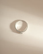 Sterling silver Pear Statement Ring by Sami Jewels, top view showing its elegant pear-shaped design and polished finish.