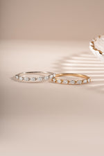 Gold and sterling silver Pear Stone Stacking Ring by Sami Jewels, featuring a pear-shaped gemstone design.