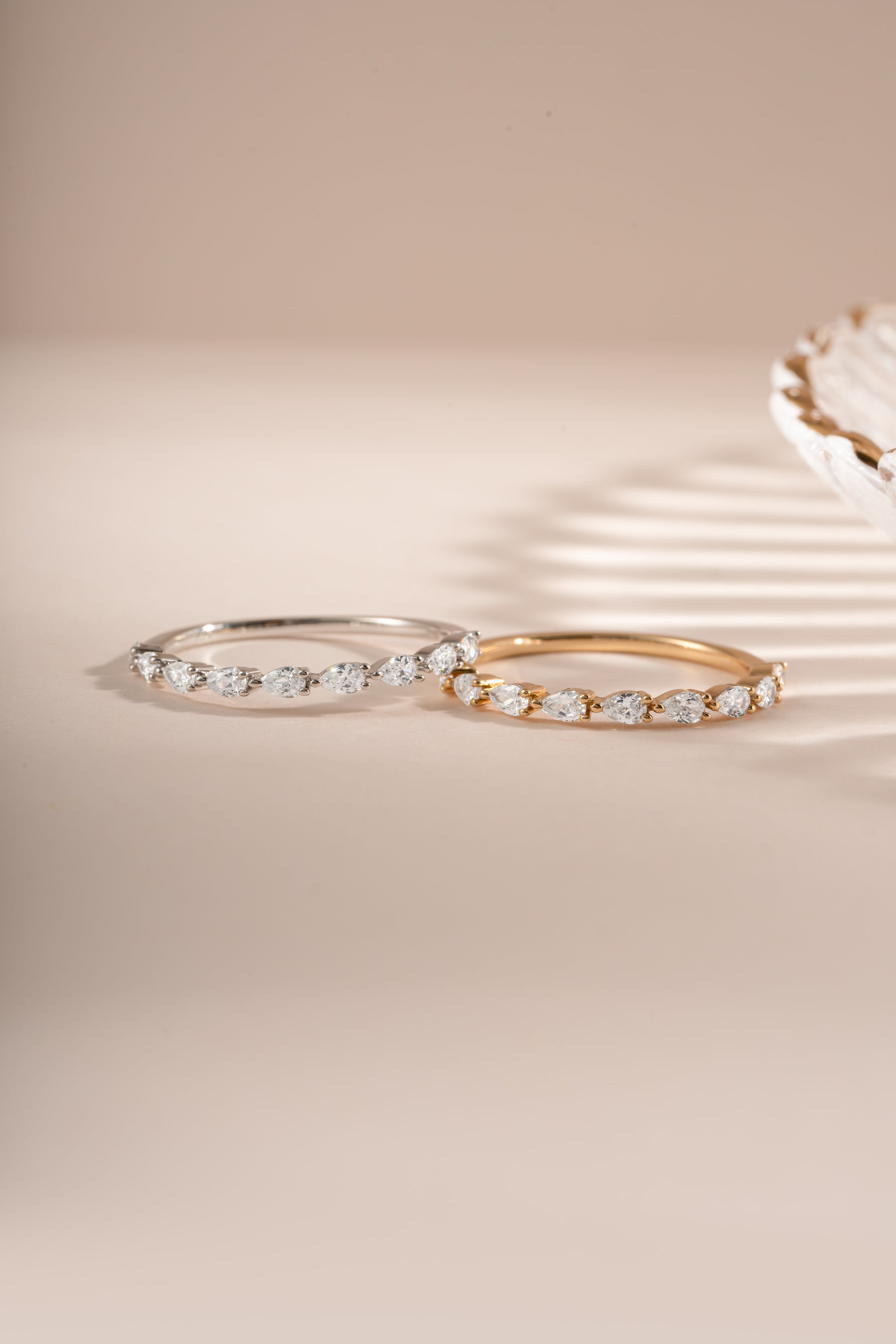 Gold and sterling silver Pear Stone Stacking Ring by Sami Jewels, featuring a pear-shaped gemstone design.