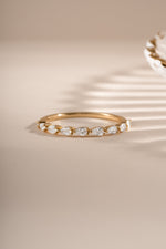 Gold Pear Stone Stacking Ring from Sami Jewels, showcasing a detailed pear-shaped gemstone on a sleek band.