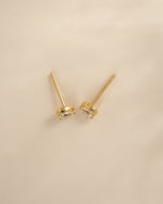 Gold Tiny Pear Stud Earrings from Sami Jewels, top view showing small, elegant pear-shaped design in shiny gold finish.