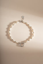 Sterling silver beaded pearl bracelet by Sami Jewels featuring elegant white pearls on a delicate chain.