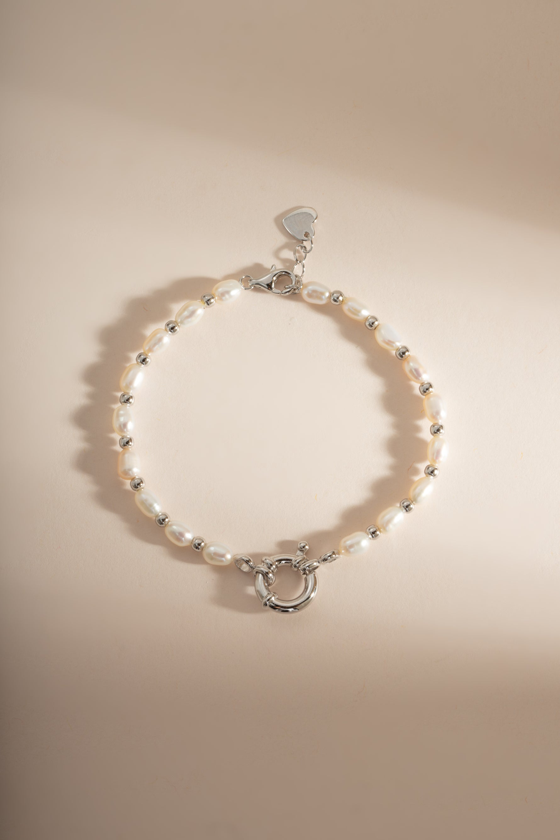 Sterling silver beaded pearl bracelet by Sami Jewels featuring elegant white pearls on a delicate chain.