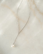 Sterling silver Pearl Lariat necklace with dangling pearls from Sami Jewels, showcasing elegant jewelry design.