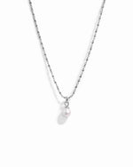 Sterling silver pearl pendant necklace from Sami Jewels featuring a round white pearl on a delicate chain.