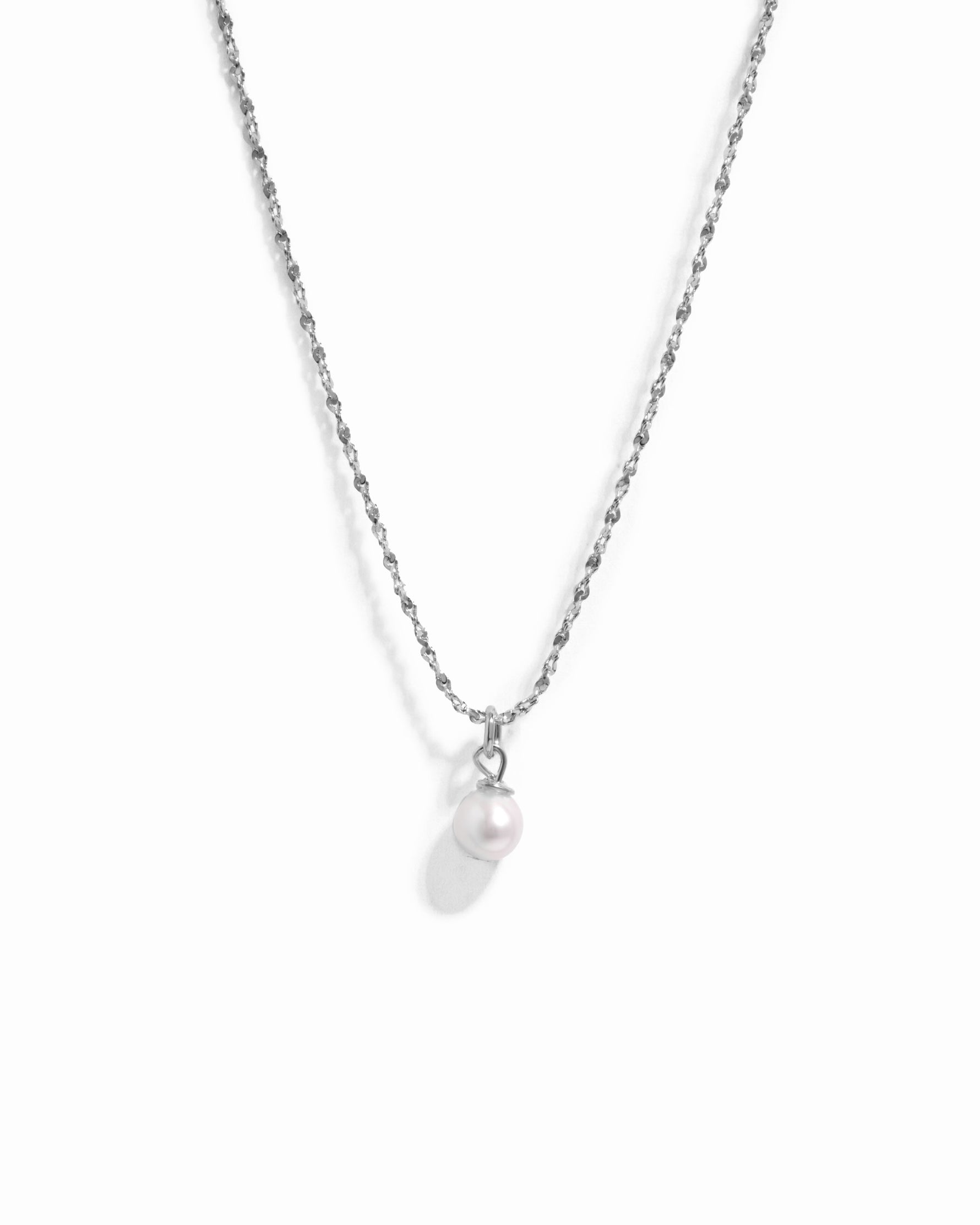 Sterling silver pearl pendant necklace from Sami Jewels featuring a round white pearl on a delicate chain.