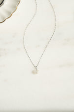 Sterling silver pearl pendant necklace from Sami Jewels featuring a single lustrous pearl hanging on a delicate chain.