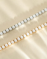 Sami Jewels SS Pearl Tennis Bracelet with silver and gold stainless steel, waterproof, featuring elegant pearl beads.