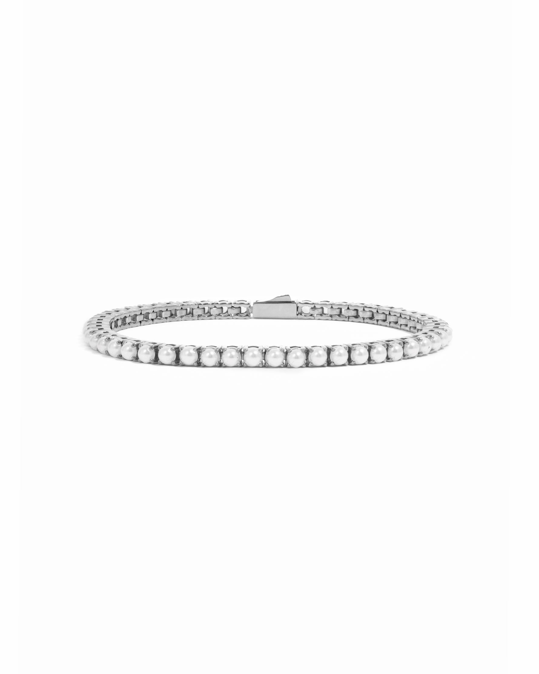 Sami Jewels SS Pearl Tennis Bracelet featuring white pearls and stainless steel design, waterproof and elegant for everyday wear.