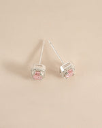 Sami Jewels Arielle pink baguette sterling silver stud earrings viewed from the top, showcasing their elegant design and sparkling stones.