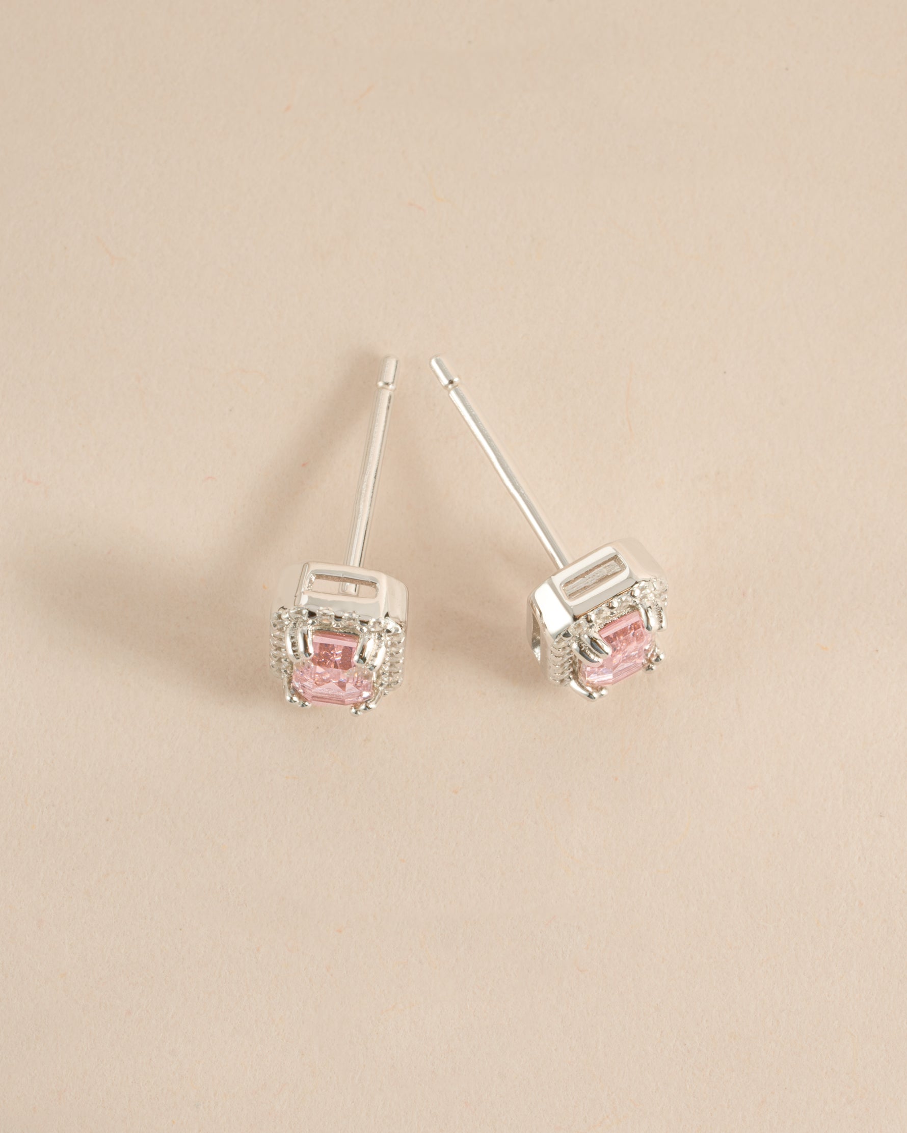 Sami Jewels Arielle pink baguette sterling silver stud earrings viewed from the top, showcasing their elegant design and sparkling stones.