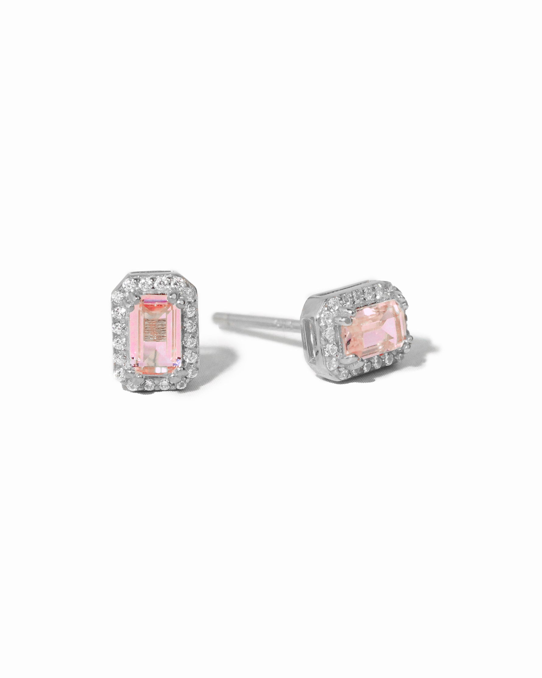 Pink baguette sterling silver stud earrings by Sami Jewels displayed on a white background.