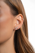 Sami Jewels Arielle Stud Earrings with pink baguette-shaped gemstones set in sterling silver.