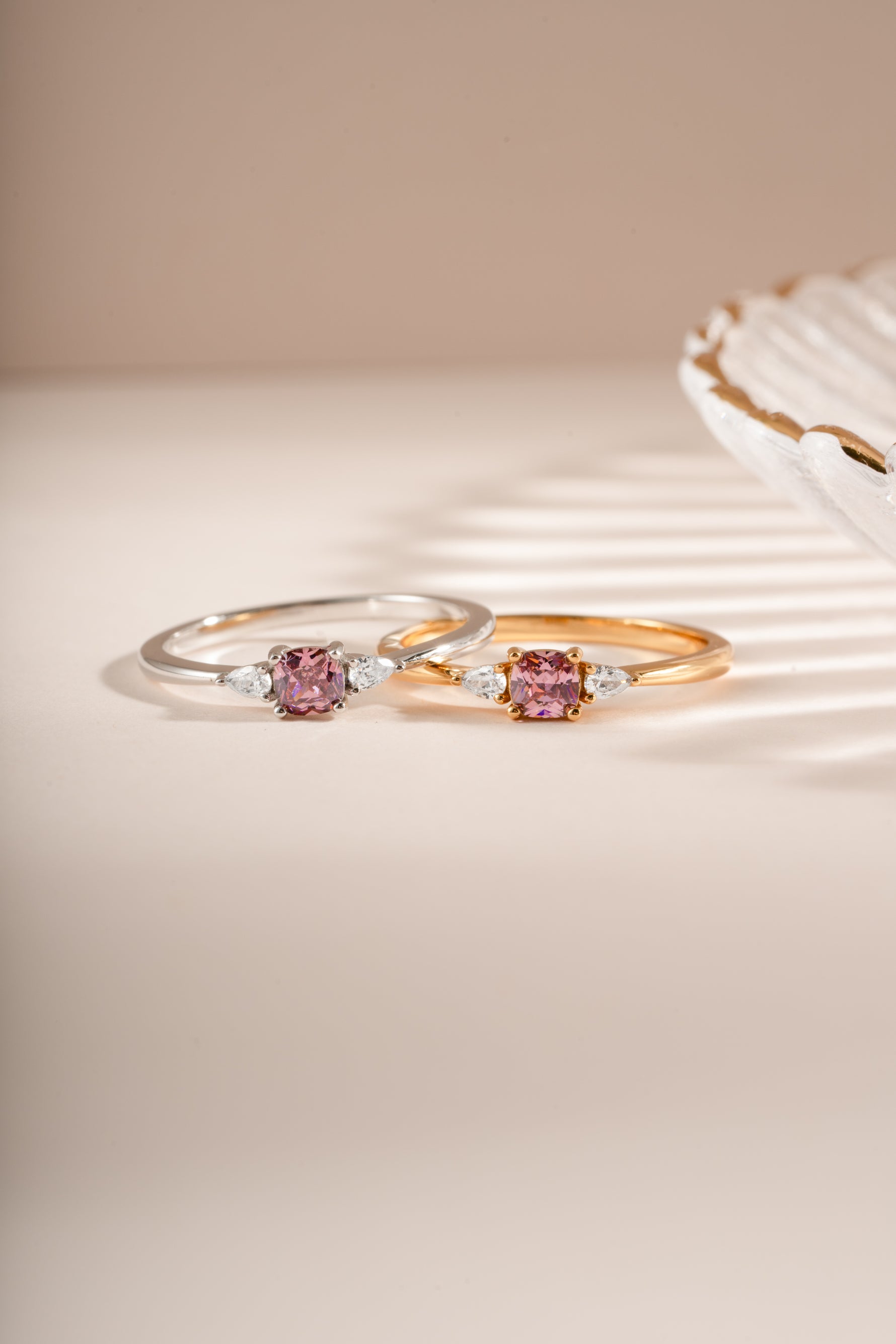 Pink cushion ring from Sami Jewels featuring gold and sterling silver, with a soft pink gemstone and elegant design.
