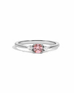 Pink cushion ring by Sami Jewels, sterling silver ring with a pink cushion gemstone on a white background.