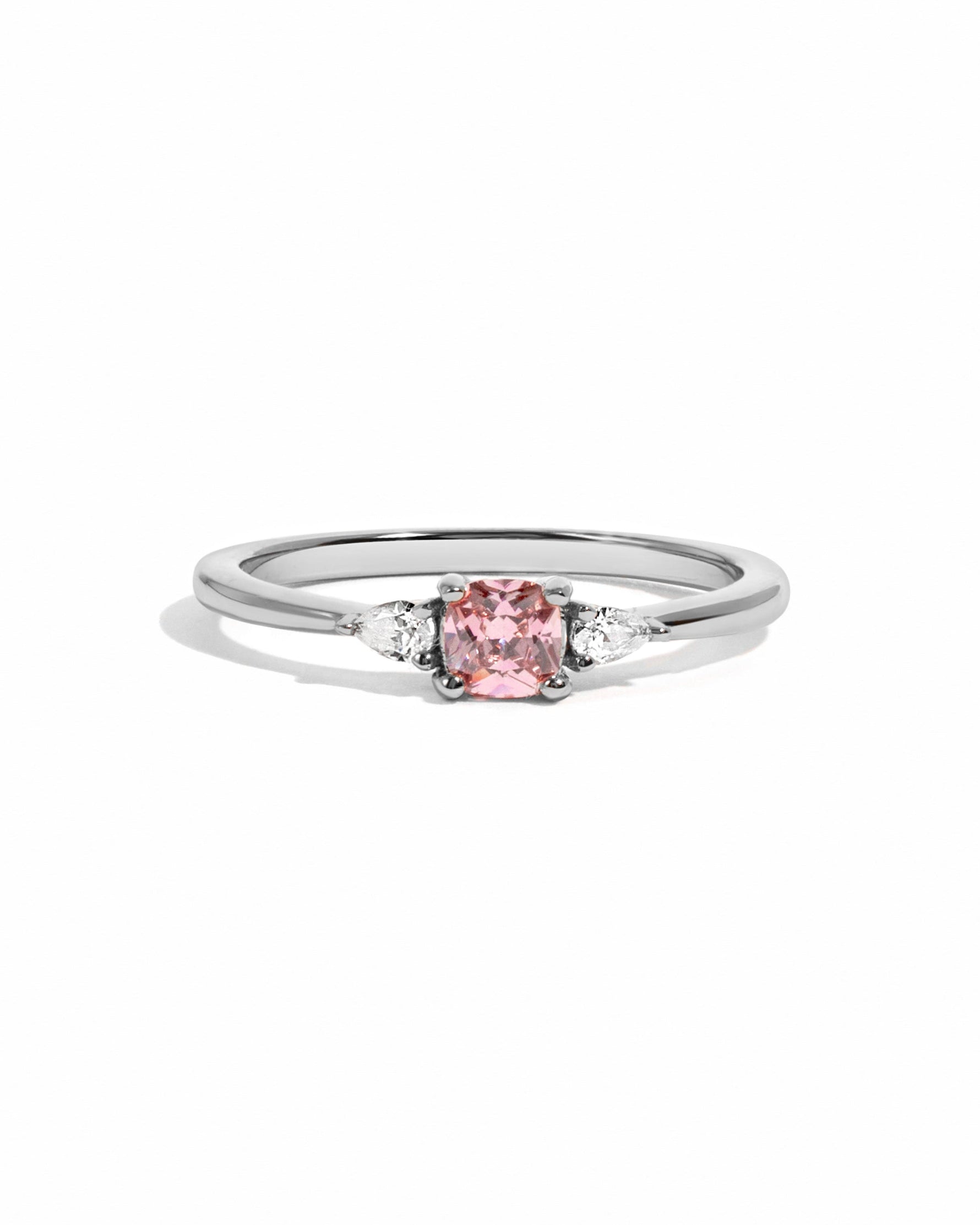Pink cushion ring by Sami Jewels, sterling silver ring with a pink cushion gemstone on a white background.