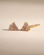 Pink three-stone gold earrings with tiny rose accents, Sami Jewels 3-stone stud earrings for a delicate, elegant look.