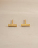 Gold plain bar stud earrings from Sami Jewels, side view showcasing sleek, minimalist design and secure post backing.