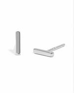 Sterling silver plain bar stud earrings by Sami Jewels, simple minimalist jewelry with sleek straight bars on a white background.