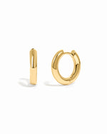 plain huggie hoop earring in 9mm in gold on a white background