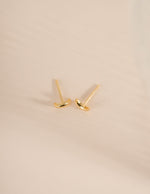 Gold plain moon stud earrings by Sami Jewels, side view showing simple round moon-shaped design.